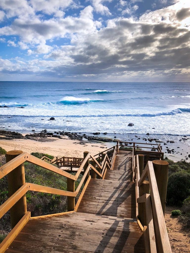 brown wooden dock under white clouds scopio ebddacd0 fc50 4a1d 91e5 ea1f0117a0f8